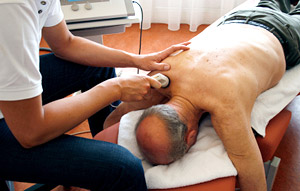 senior citizen receiving chronic pain management therapy